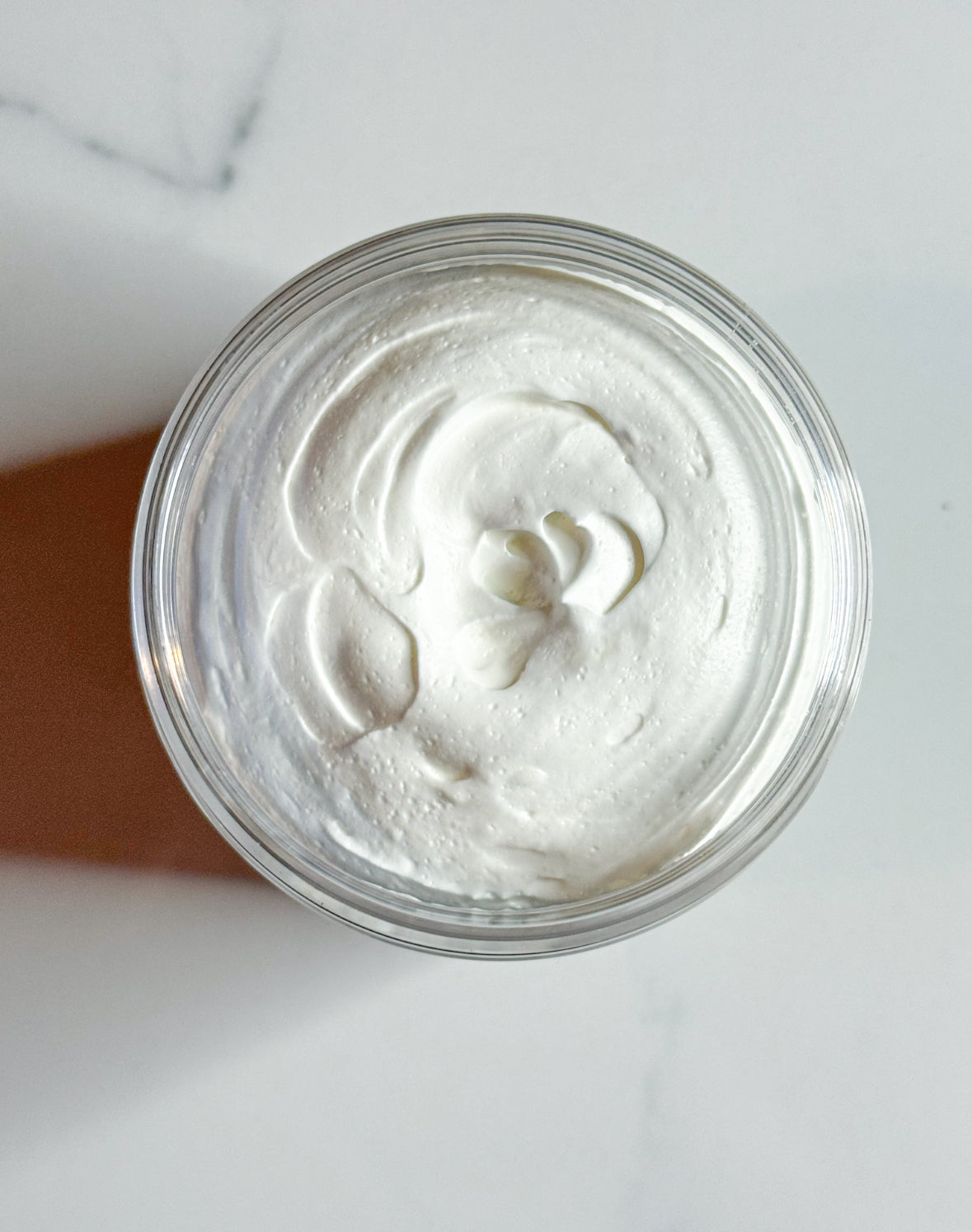 Picture of whipped body butter made with Shea butter, avocado oil, kokum butter, vitamin e oil and skin safe fragrance